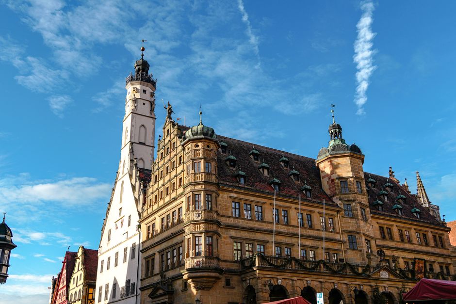 Stunning view of Rothenburg ob der Tauber's town hall on a sunny day showcasing its unique architecture.