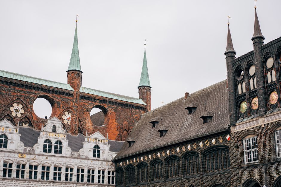 Gothic architectural details of Lübeck's historic town hall in Germany.